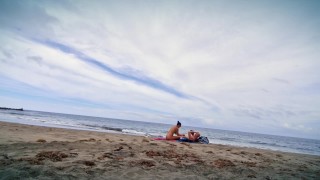 TASHA SINZ gives a Random Stranger a Handjob at the Nudist Beach