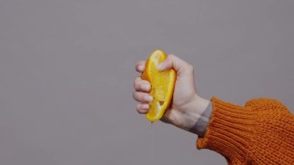 Squeezing an orange