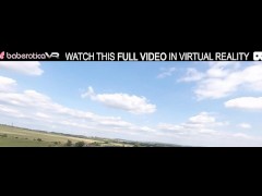 Solo horny girl Ornela Morgan masturbating outside on the grass in VR.