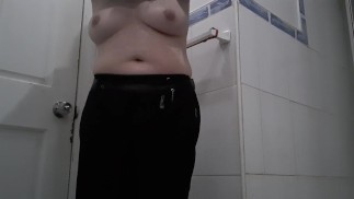 Chubby MILF changes clothes in bathroom