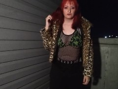 Goth girl models on rooftop at night in bikini