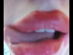 Dirty mouth with braces red lips bare tits and huge nipples. Tongue play