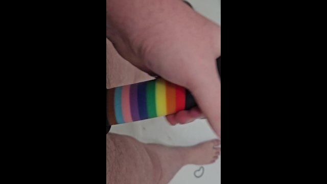 Washing my rainbow cock