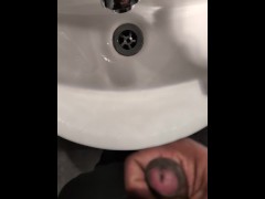 Masturbating in the public toilets washbin