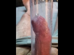 Pierced cock cumming in penis pump