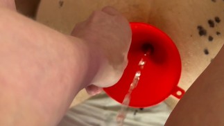 I peed inside my dirty and obedient slut's gaping asshole through a funnel