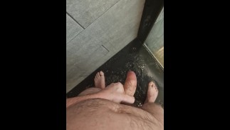 Horny in the shower wearing my white thong. I finished with a nice cumshot