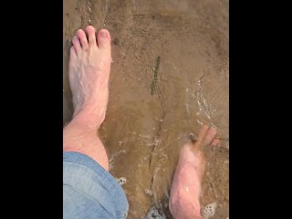 Walking in the Water and Sand Barefoot