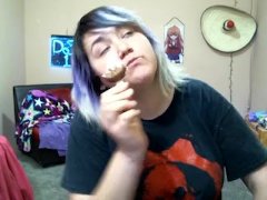 eating chocolate covered ice cream popsicle