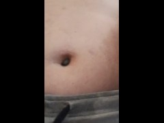 My fiance playing  with my belly button from behind