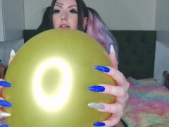 Balloon fetish. Dominatrix Nika inflates balloons, scratches and pops them.