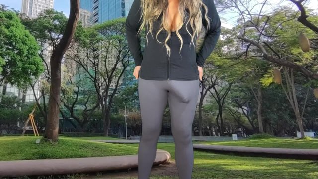 Monster cock shemale teasing in public park