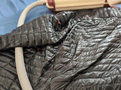 Vacuuming Dark Shark Ghost Whisperer Down Jacket with Vintage Electrolux Vacuum Cleaner