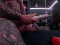 Riding a huge dildo