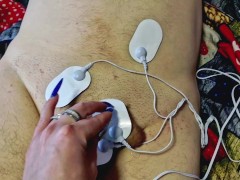 Dominatrix Nika plays with electric discharges on the genitals of the slave. Electrostimulation