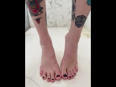 sexy trans girl pissing on her own feet and teasing