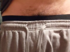Flexing biceps and flashing big cock