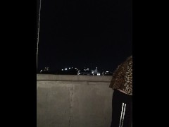 Crazy crab girl takes pics on the roof