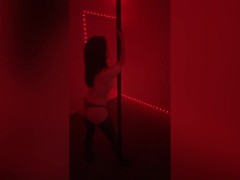 Cute girl strip tease pole dancing