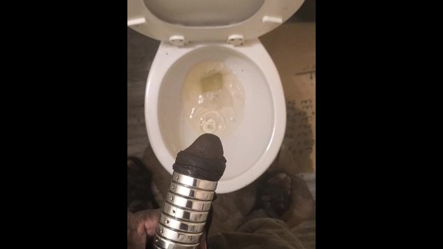 Pissing with D+ cock weights 10" Dick