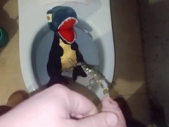 Blue t-rex Peeing