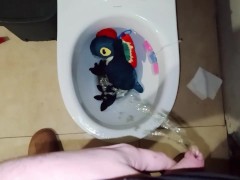 Blue t-rex peeing