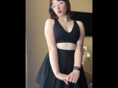 Chic brunette in skirt shows her panties under her skirt