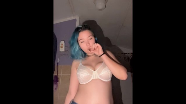 Hot goth chick gets high while showing her titties