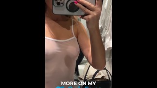 A sexy babe shows her TITS and nipples in a transparent dress