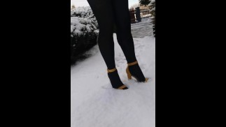 In heels and tights in the snow
