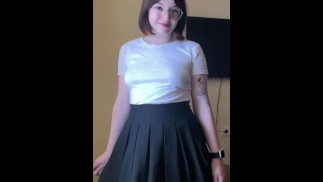 Chic brunette in skirt shows her panties