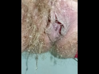Gorgeous fart and massive waterfall of piss from a juicy hairy pussy in red panties 💦 closeup
