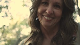 Sexy, hot, mature MILF park ranger gets caught by a young, lost hiker. -Roxy, the Park Ranger