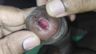 Desi Indian  playing with Cock, peehole lookin, deep inside, foreskin tied up, masturbating.