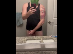 Alien stroking his cock in the mirror
