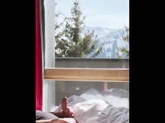 Waking up in the mountains and jerking to a cumshot in front of the bedroom window.