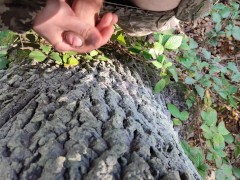 A hunter in the forest decided to jerk off his hairy cock and came all over a tree