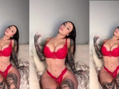 SEXY BRUNETTE BIMBO LOVES TO PLAY WITH HER HUGE TITS