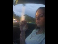 Milf smoking cigarettes while in passenger seat in vehicle - Screenshot 15 of 16 - Smoking Fetish