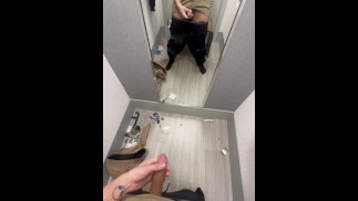 young latino man strokes uncut dick in dressing room