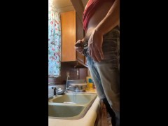 Taking a very desperate piss in kitchen sink after getting back  from running errands