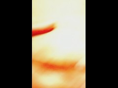 Masturbating in front of a lamp with green light