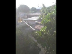 Flashing the neighbors while sunbathing