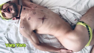 Passionate handsome tattooed guy gets romantic solo sex in bedroom. Music video