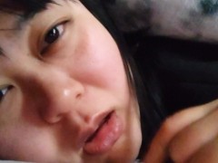 The facial expression of a Japanese woman while masturbating.