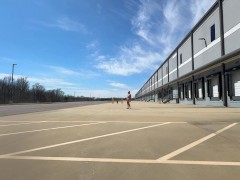 Walking behind a warehouse naked in broad daylight