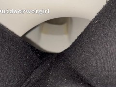Pissing horse riding pants on toilet