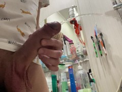 Morning pissing of uncircumcised penis in the bathroom