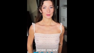 A cute brunette tries on a transparent top and shows off her TITS