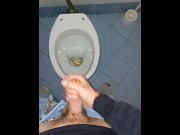 a young guy went into a dirty public toilet to pee and jerk off